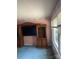 Cozy room featuring built-in shelving units and large windows at 8524 Anette Ave, Mint Hill, NC 28227