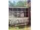 Relaxing screened porch with access to a backyard, creating an inviting place to enjoy the outdoors at 8524 Anette Ave, Mint Hill, NC 28227