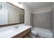 Bathroom with modern fixtures, tub, and vanity at 8540 Indian Summer Trl, Harrisburg, NC 28075