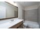 Bathroom with modern fixtures, tub, and vanity at 8540 Indian Summer Trl, Harrisburg, NC 28075