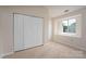 Bedroom featuring closet space and a window at 8540 Indian Summer Trl, Harrisburg, NC 28075