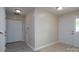 Welcoming foyer with tile and wood floors, coat closet, and access to the main living areas at 8540 Indian Summer Trl, Harrisburg, NC 28075