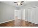 Bedroom featuring vinyl floors and ample closet space at 8731 Coralbell Ln, Charlotte, NC 28213