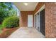 This outdoor patio has brick siding and stone flooring at 8731 Coralbell Ln, Charlotte, NC 28213