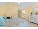Bright bedroom with vaulted ceiling, desk and ensuite bathroom at 9918 Windrow Dr, Indian Trail, NC 28079