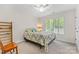 Bedroom with bright window and comfortable space at 9918 Windrow Dr, Indian Trail, NC 28079