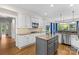 Well-appointed kitchen with granite countertops, stainless steel appliances, and an island, perfect for cooking at 9918 Windrow Dr, Indian Trail, NC 28079