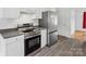 Modern kitchen featuring stainless steel appliances and sleek countertops at 1028 Swaying Oats Dr, York, SC 29745