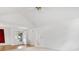 Bright living room featuring vaulted ceilings, a ceiling fan, white walls, and a door leading to the deck at 1028 Swaying Oats Dr, York, SC 29745