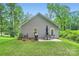 Spacious backyard with patio area perfect for entertaining and relaxing in nature at 105 W 17Th St, Salisbury, NC 28144