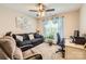 Inviting bedroom/office offers a tranquil space with a comfortable sofa, workspace, and lots of light at 105 W 17Th St, Salisbury, NC 28144