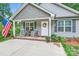 Close-up of a cozy front porch with rocking chairs and a welcoming entrance at 105 W 17Th St, Salisbury, NC 28144