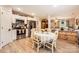 Open-concept kitchen and dining area features wood floors and seamlessly connects to a cozy living space at 105 W 17Th St, Salisbury, NC 28144