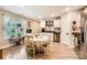 Bright kitchen and breakfast nook with decorative plates, and modern flooring and appliances at 105 W 17Th St, Salisbury, NC 28144