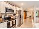 Well-equipped kitchen with stainless steel appliances and an open layout to the living area at 105 W 17Th St, Salisbury, NC 28144