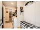 Convenient laundry area with storage, built-in bench, and stylish decor elements at 105 W 17Th St, Salisbury, NC 28144