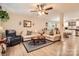 Spacious living room featuring a sectional sofa, ceiling fan, and open floor plan at 105 W 17Th St, Salisbury, NC 28144