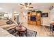 Inviting living room with a large TV cabinet and seamless flow to the kitchen at 105 W 17Th St, Salisbury, NC 28144