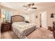 Comfortable main bedroom features a tufted headboard, neutral decor, and ample natural light at 105 W 17Th St, Salisbury, NC 28144