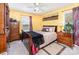 Comfortable bedroom with a ceiling fan, wooden furniture, and carpet at 1076 Braxton Dr, Concord, NC 28025