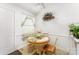 Cozy breakfast nook with a small table, chairs, and natural light at 1076 Braxton Dr, Concord, NC 28025