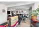 Spacious living room with entertainment area, comfortable seating, and access to outdoor space at 1076 Braxton Dr, Concord, NC 28025