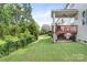 A fenced backyard with a patio offers plenty of space for outdoor activities and relaxation at 10911 Skymont Dr, Huntersville, NC 28078