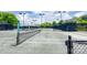 A well-maintained community tennis court with new nets and lighting at 10911 Skymont Dr, Huntersville, NC 28078