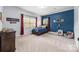 Spacious bedroom with natural light and carpet floors at 1115 Wynnbrook Way, Concord, NC 28027