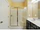 Bathroom features a glass-enclosed shower with a built-in seat and tiled surround at 11209 Lazio Ln # 1, Charlotte, NC 28277