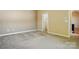 Spacious bedroom with neutral colors and large window, ready for your personal touch at 11209 Lazio Ln # 1, Charlotte, NC 28277