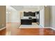 Spacious kitchen with dark cabinets and hardwood flooring throughout at 11209 Lazio Ln # 1, Charlotte, NC 28277