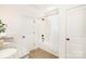 Clean and simple bathroom with granite countertops, and a shower-tub combo at 1129 Thayer Glen Ct, Charlotte, NC 28213