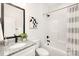 Bathroom with shower/tub, granite vanity with black fixtures, and modern design at 1129 Thayer Glen Ct, Charlotte, NC 28213
