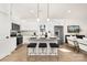 Eat-in kitchen with stainless steel appliances, granite countertops, and barstool seating at 1129 Thayer Glen Ct, Charlotte, NC 28213