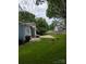 View of a grassy backyard, light blue house, and a neighboring home at 117 Blackberry Ln # 66, Mooresville, NC 28117