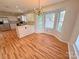 Dining area with hardwood floors, chandelier, and lots of natural light at 117 Blackberry Ln # 66, Mooresville, NC 28117