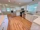 Bright kitchen features stainless steel appliances, white cabinets, and light counter tops at 117 Blackberry Ln # 66, Mooresville, NC 28117