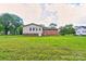Large backyard with lush green grass, ideal for relaxation and recreation at 1184 Cambridge Dr, Shelby, NC 28152