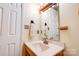 This functional bathroom includes a sink, vanity, and a bright mirror for your morning routine at 1184 Cambridge Dr, Shelby, NC 28152