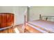 Inviting bedroom with lovely wood floors and wardrobe with lots of storage at 1184 Cambridge Dr, Shelby, NC 28152