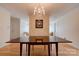 Elegant dining room with hardwood floors, a chandelier, and neutral wall color at 1184 Cambridge Dr, Shelby, NC 28152