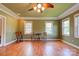 Spacious living room with bright windows, hardwood floors and a ceiling fan at 1184 Cambridge Dr, Shelby, NC 28152