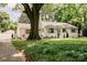 Traditional-style home boasts mature trees and landscaping at 1184 Thornwell Ave, Rock Hill, SC 29732