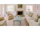 Bright living room features a cozy fireplace, neutral tones, and ample seating at 1184 Thornwell Ave, Rock Hill, SC 29732