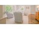 Cozy living room with natural light, neutral furniture, and hardwood floors at 1184 Thornwell Ave, Rock Hill, SC 29732