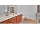 Bathroom featuring double sinks, tiled floors, and a step stool at 1225 Madison Green Dr, Fort Mill, SC 29715