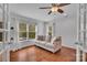 Cozy room with large window, hardwood floors, and neutral color palette at 1225 Madison Green Dr, Fort Mill, SC 29715