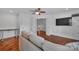 Bright room featuring hardwood floors, neutral walls, and French doors at 1225 Madison Green Dr, Fort Mill, SC 29715