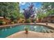 A beautifully landscaped pool area with a well maintained pool is ready for you to enjoy with Gathering and friends at 1225 Madison Green Dr, Fort Mill, SC 29715